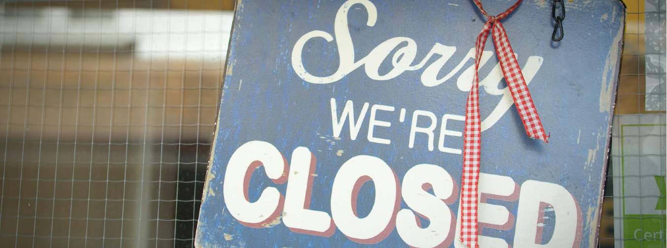 Closed sign on a shop door