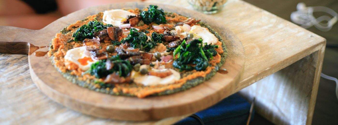 Vegan pizza photographed by Gabrielle Cepella on Unsplash
